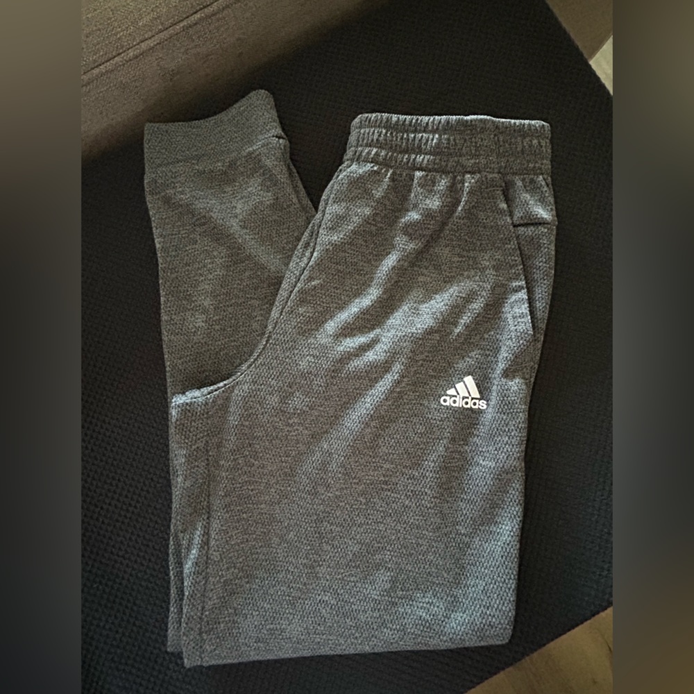 Adidas heather charcoal gray sweatpants; size M. Front pockets.